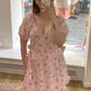 Geblümtes Wickelkleid aus Musselin rosa