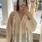 Bluse mit Rüschen creme