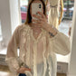 Bluse mit Rüschen creme